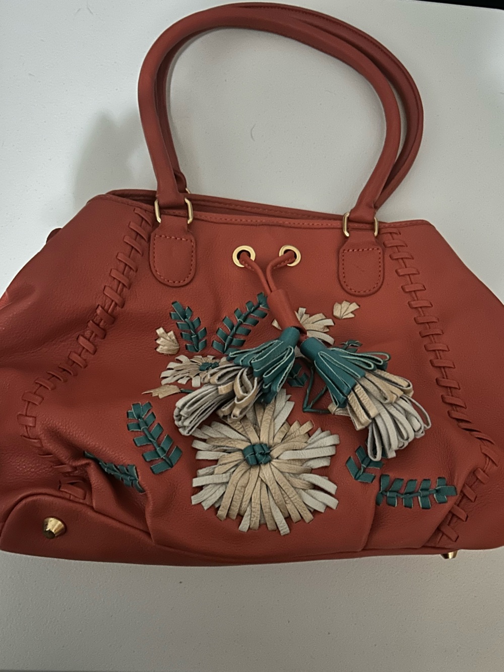 Isabella Fiore Rust Floral Tassel Tote with Teal and Cream Accents